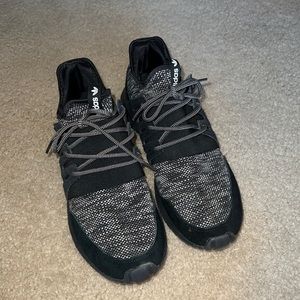 black and grey adidas tubulars